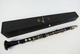 Clarinet. An unbranded clarinet, 65cm in length.