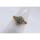 A 9ct yellow gold and diamond ring,