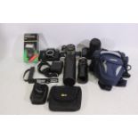 Minolta, Petri, Zenit, Hanimex, Shandon - A small lot of 4 x cameras, lenses, camera cases,