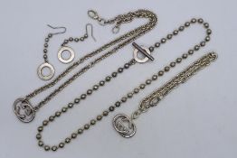 A collection of white metal (stamped 925) Gucci jewellery comprising earrings,