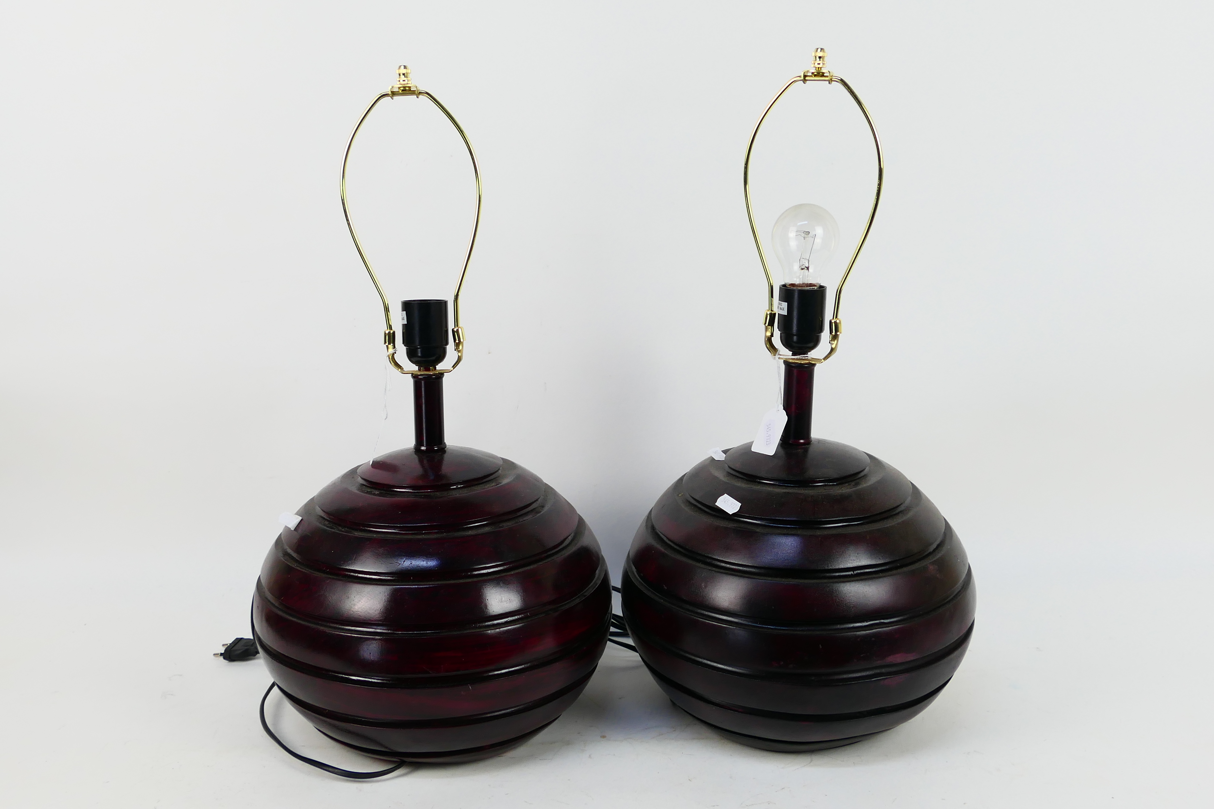 A pair of table lamps with turned wood bases, approximately 56 cm (h).