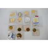 A collection of United States commemorative coins to include a 1933 Gold Double Eagle replica (24k