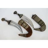 Two steel blade North African or Middle Eastern jambiya,