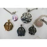 Six pendants of which one weighing 2.