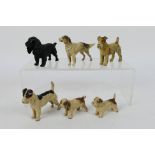 A group of vintage cast metal, Austrian style, cold painted models of dogs,