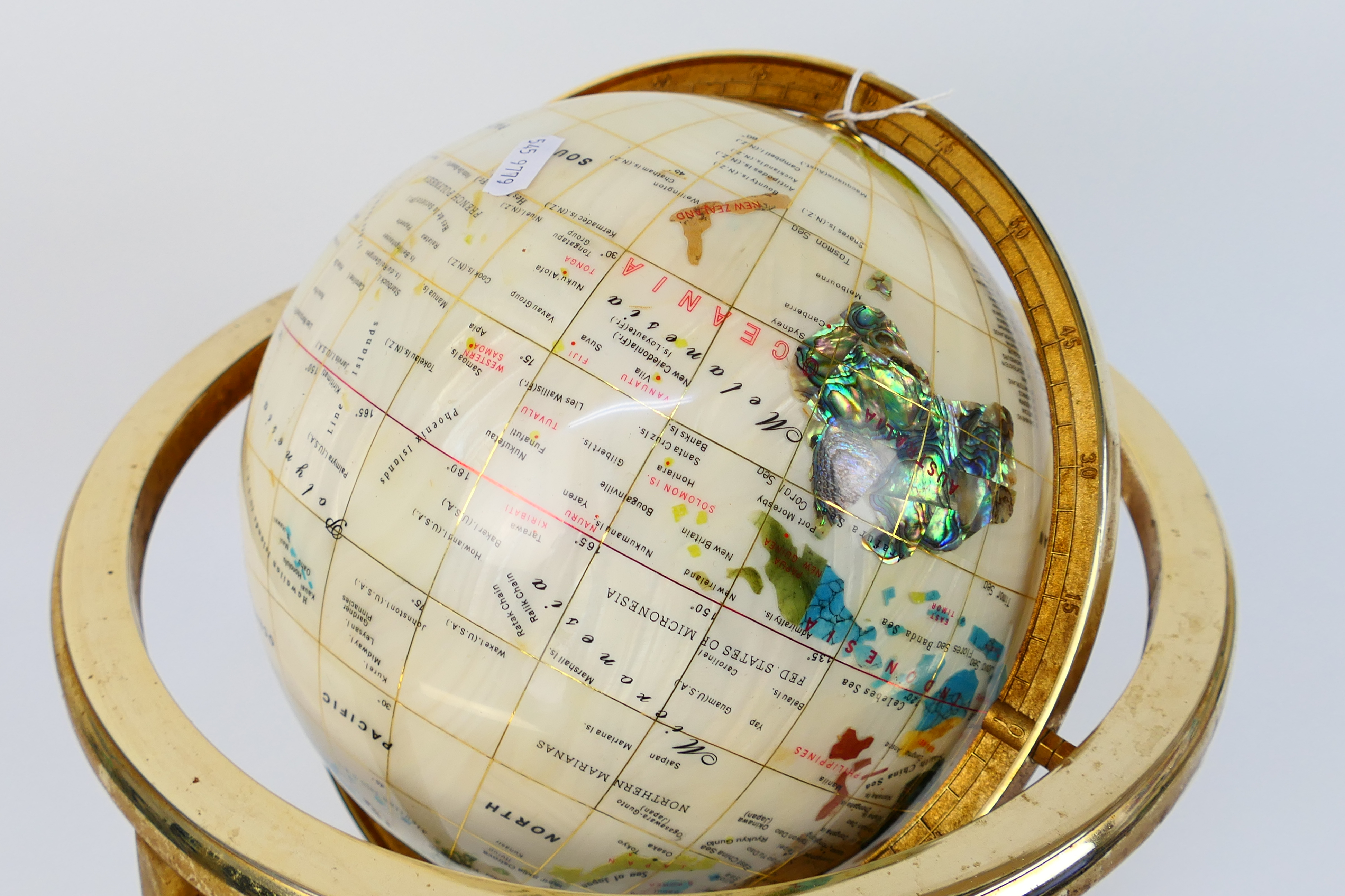 A gemstone terrestrial globe, approximately 36 cm x 30 cm. - Image 2 of 4