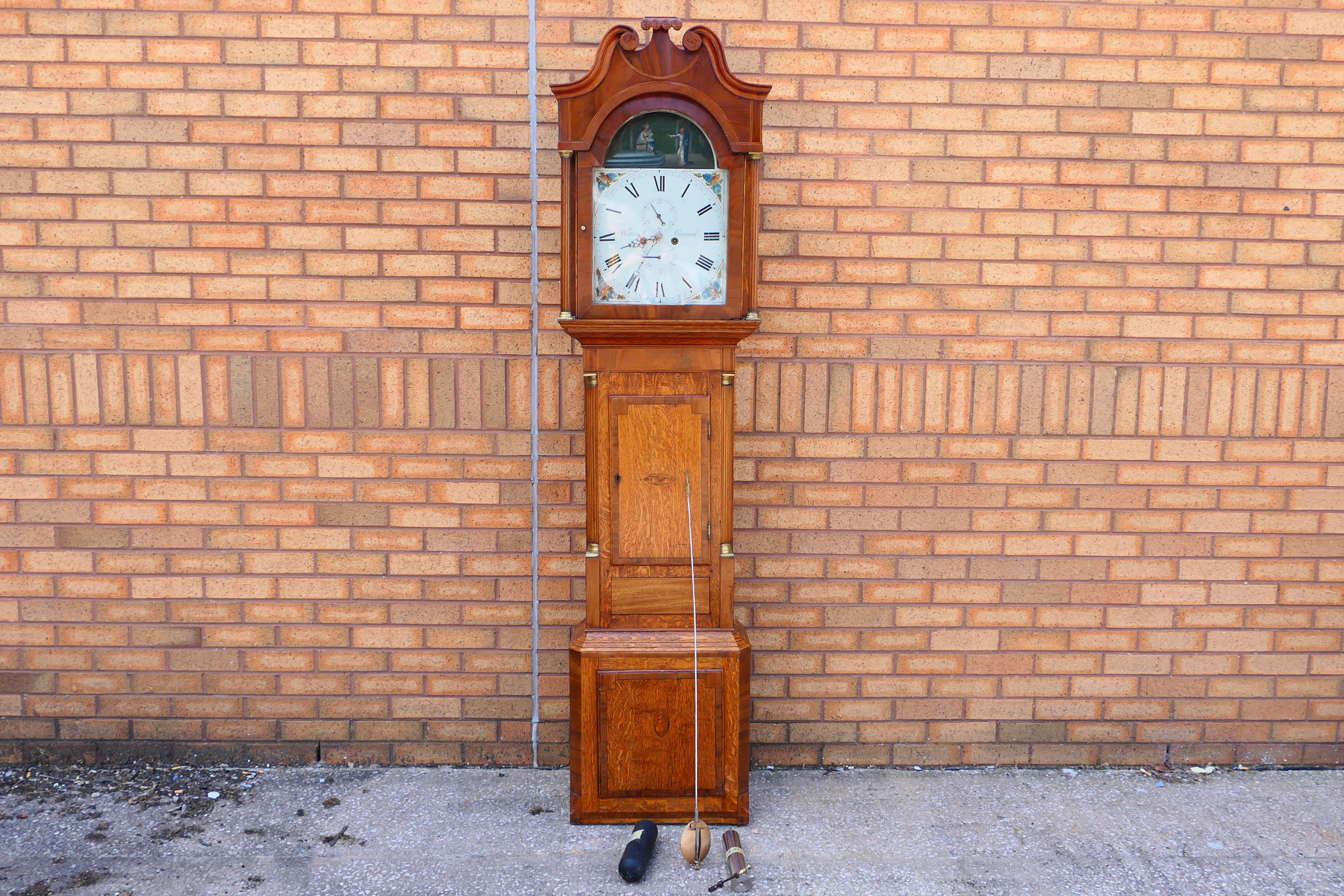 An early 19th century 8-day longcase clock, oak and crossbanded mahogany case with ¾ length door,