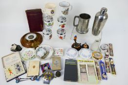 A mixed lot of collectables to include barometer, illustrated book on flowers, plated ware,