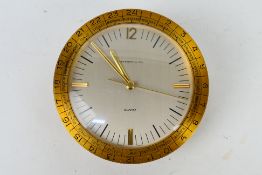 Tiffany & Co, a gilt brass World Time desk clock, approximately 11 cm (d).