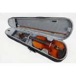 Unbranded Student Violin in case. An unbranded 4/4 scale (23.