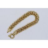 A 9ct yellow gold bracelet formed of circular links, 19 cm (l), approximately 11.4 grams.