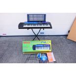 Yamaha - A boxed Yamaha PSR-73 keyboard. Comes with stand which is presented in a postage box.