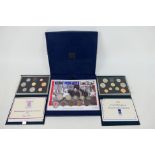 Two Royal Mint Proof Coin Collection sets comprising 1983 and 1992 and a VE Day commemorative coin