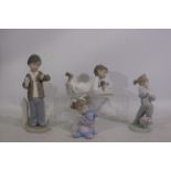 Nao - Four Nao figurines - Lot includes a girl reading a book, boy checking his watch,