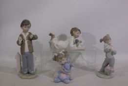 Nao - Four Nao figurines - Lot includes a girl reading a book, boy checking his watch,
