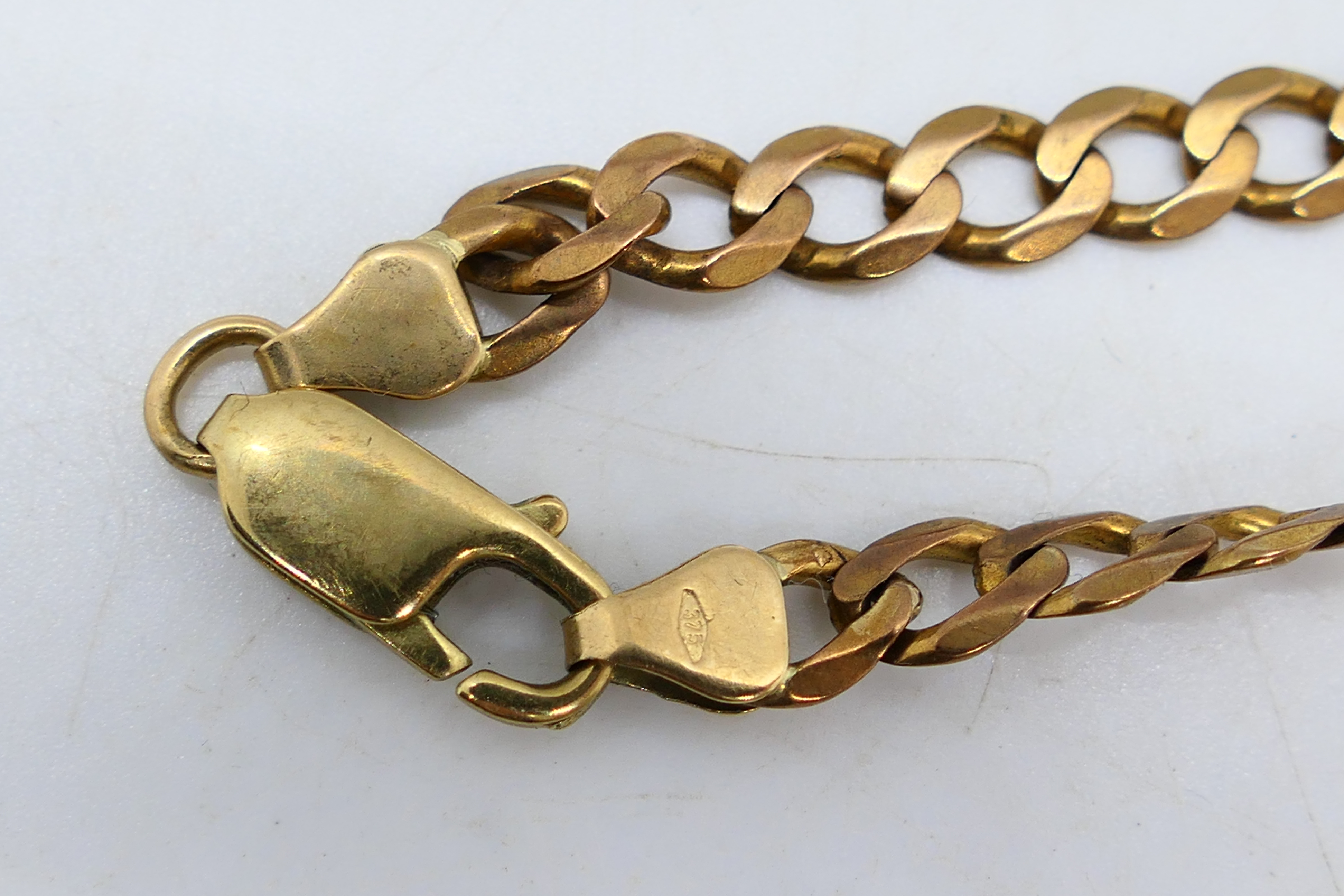 An Italian 9ct yellow gold curb link bracelet, 19 cm (l), approximately 6.2 grams. - Image 3 of 3