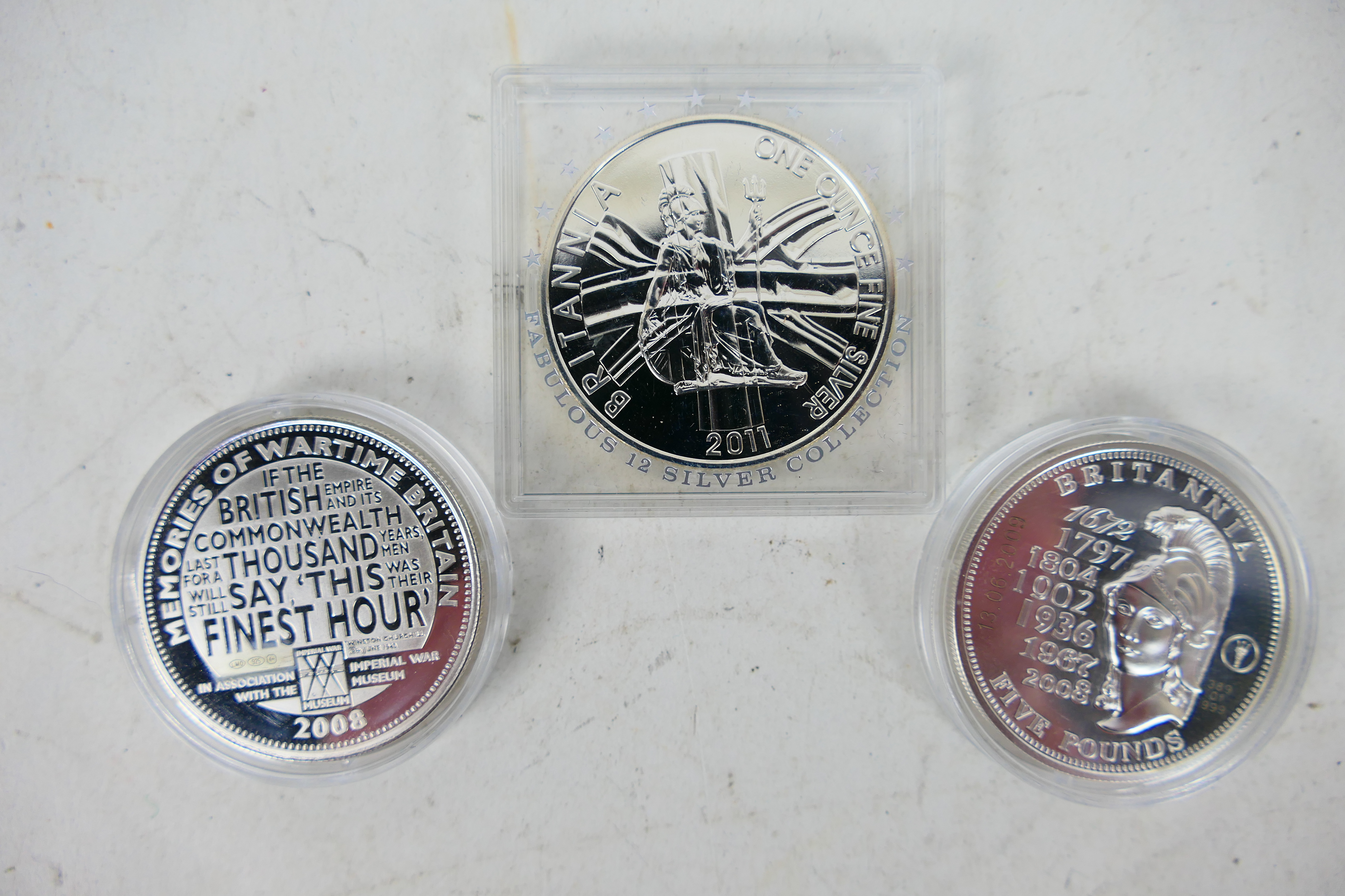 Silver Coins - Three coins to include a 2011 fine silver Britannia,