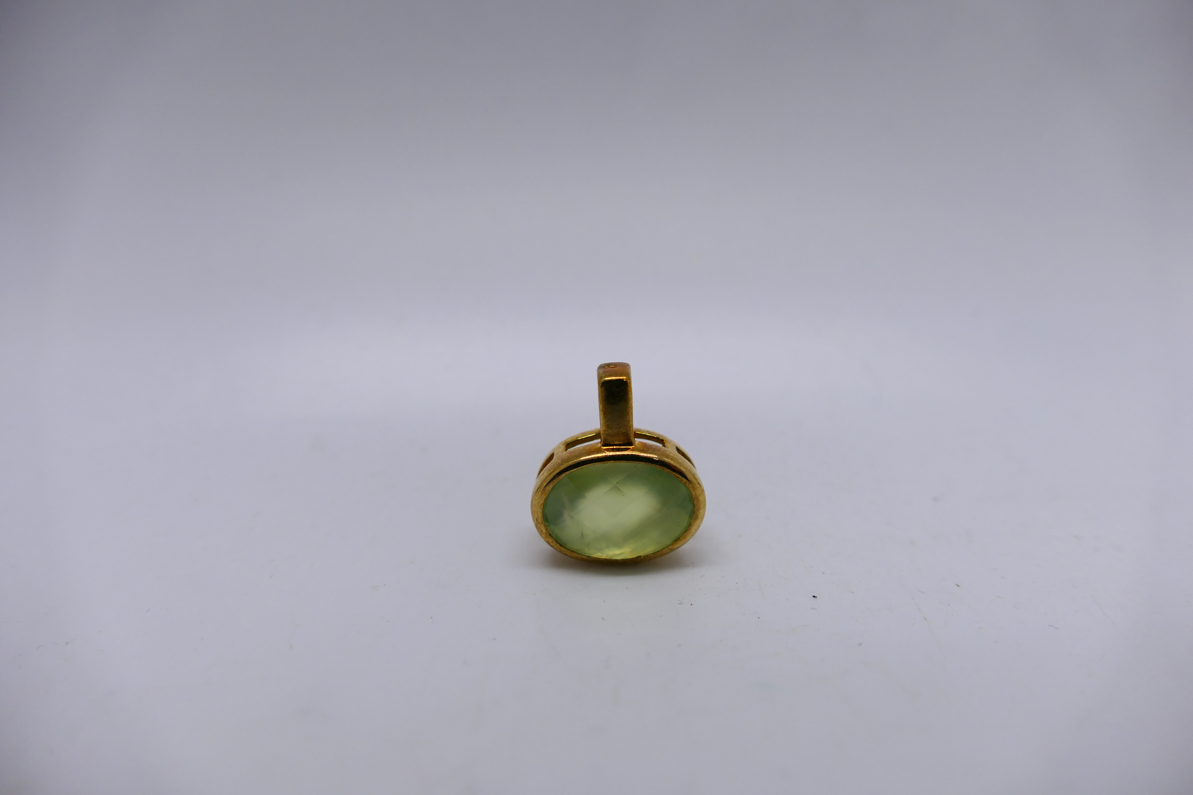 A 9ct gold stone set dress ring, size O+½, 2.3 grams and a stone set yellow metal pendant. - Image 5 of 5