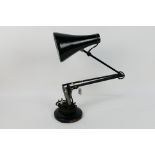 A vintage Anglepoise lamp, model 75.