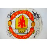 An Official Manchester United branded football bearing signatures to include Cantona, Keane, Giggs,