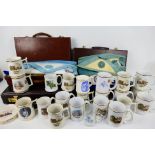 Masonic regalia cases with aprons and a quantity of masonic ceramics and glassware.