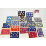 Various vintage ERII Coinage Of Great Britain sets, commemorative coin sets and similar.