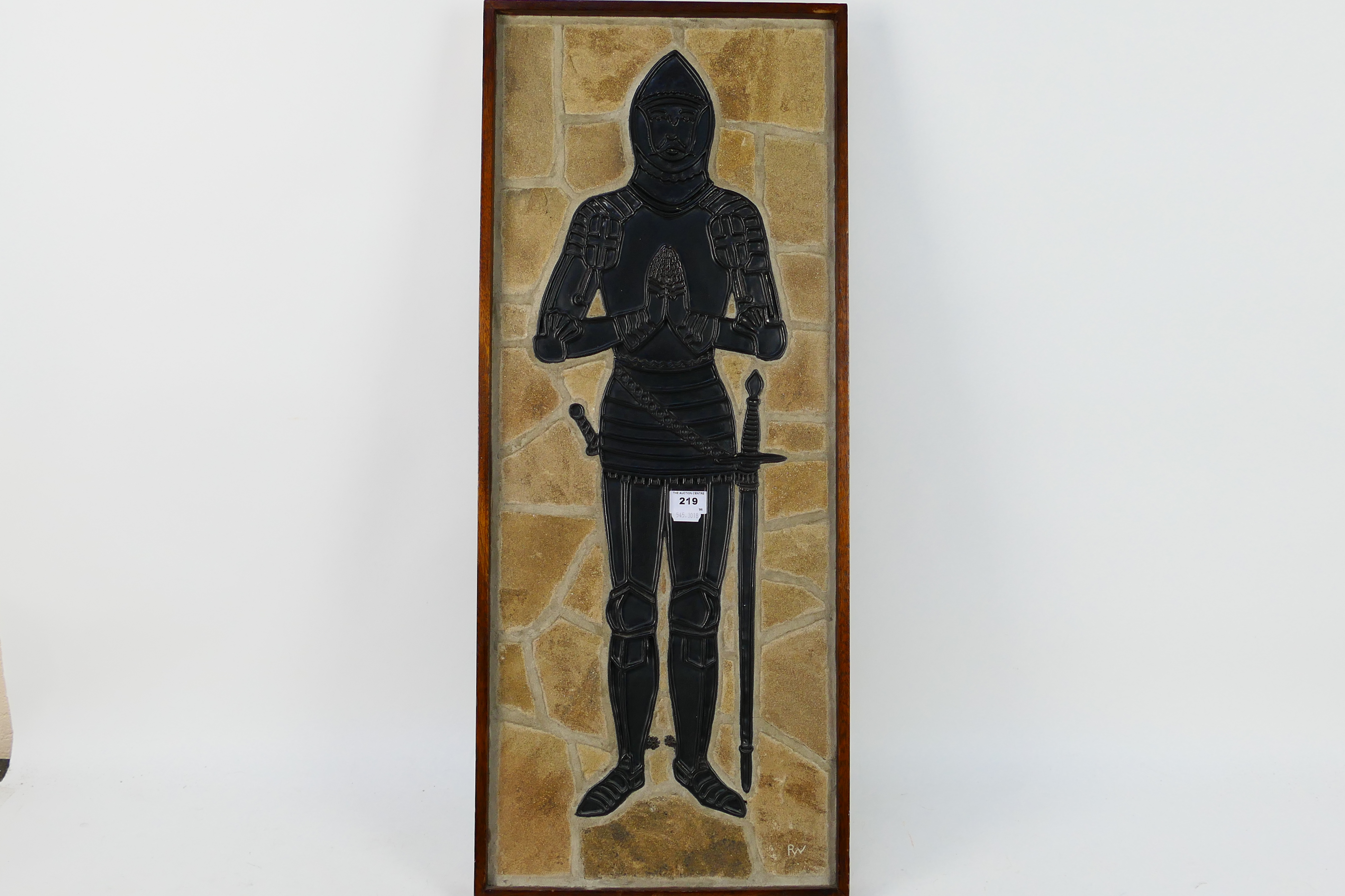 An interesting piece of wall art depicting a knight,