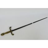 A 19th century French or European dress sword, cast brass hilt with foliate scrolls,