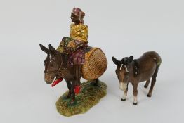 Beswick - Susie Jamaica # 1347, 17 cm (h) and a Beswick donkey figure.