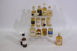 A collection of scotch whisky miniatures to include Bowmore 12 year old, The Knockdhu 12 years old,