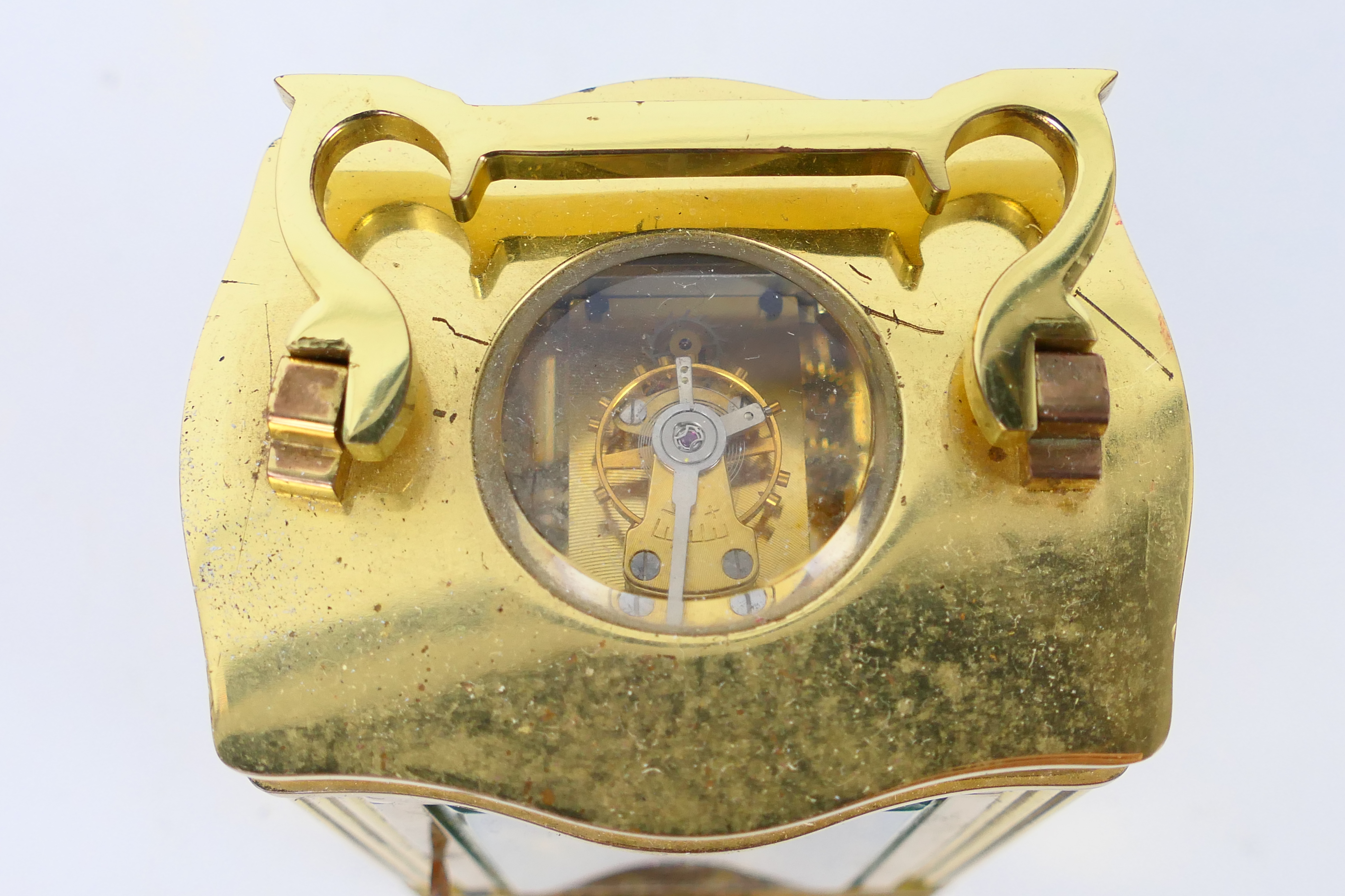 A brass and glass cased carriage clock, Roman numerals to a white dial, the dial signed Imperial, - Image 7 of 7