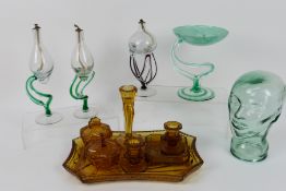 Three decorative oil candles / lamps, dressing table items, glass head and similar.
