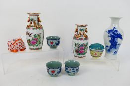 Chinese ceramics to include a blue and white vase decorated with a warrior in combat with a