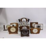 A collection of vintage clocks, predominantly by Metamec.