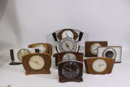 A collection of vintage clocks, predominantly by Metamec.