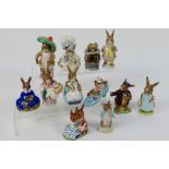 A collection of Beswick Beatrix Potter figures to include Lady Mouse, Benjamin Bunny, Mrs Rabbit,