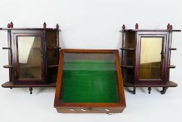 Three display units comprising two wall mountable examples,