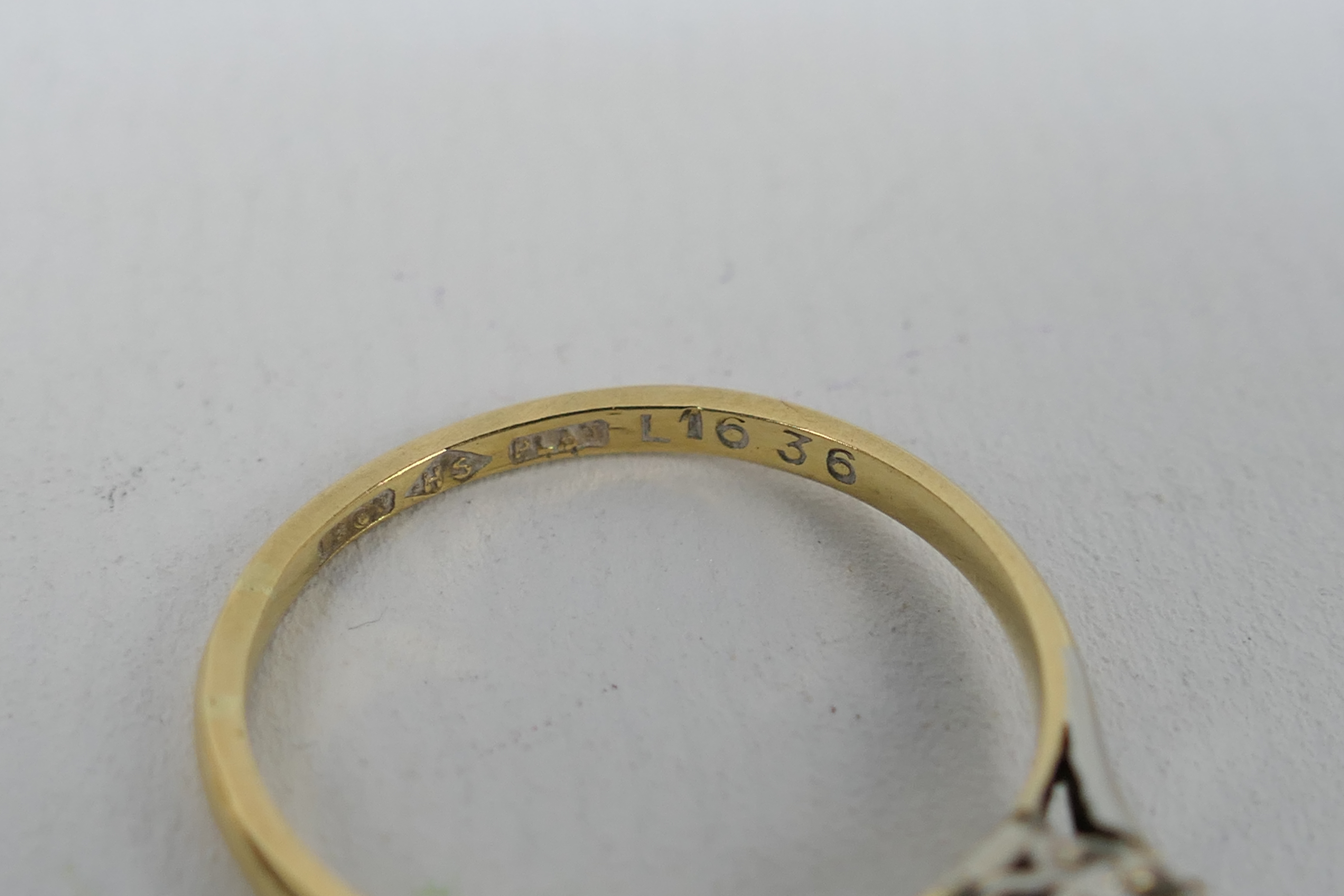 A two-tone, solitaire ring, stamped 18ct, size O, approximately 2.2 grams all in. - Image 4 of 4