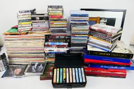 Lot to include 12" vinyl records, music cassettes, music related literature, DVDs and other,