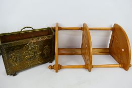 An Ercol wall mountable corner shelving unit, approximately 79 cm (h) and a magazine rack.