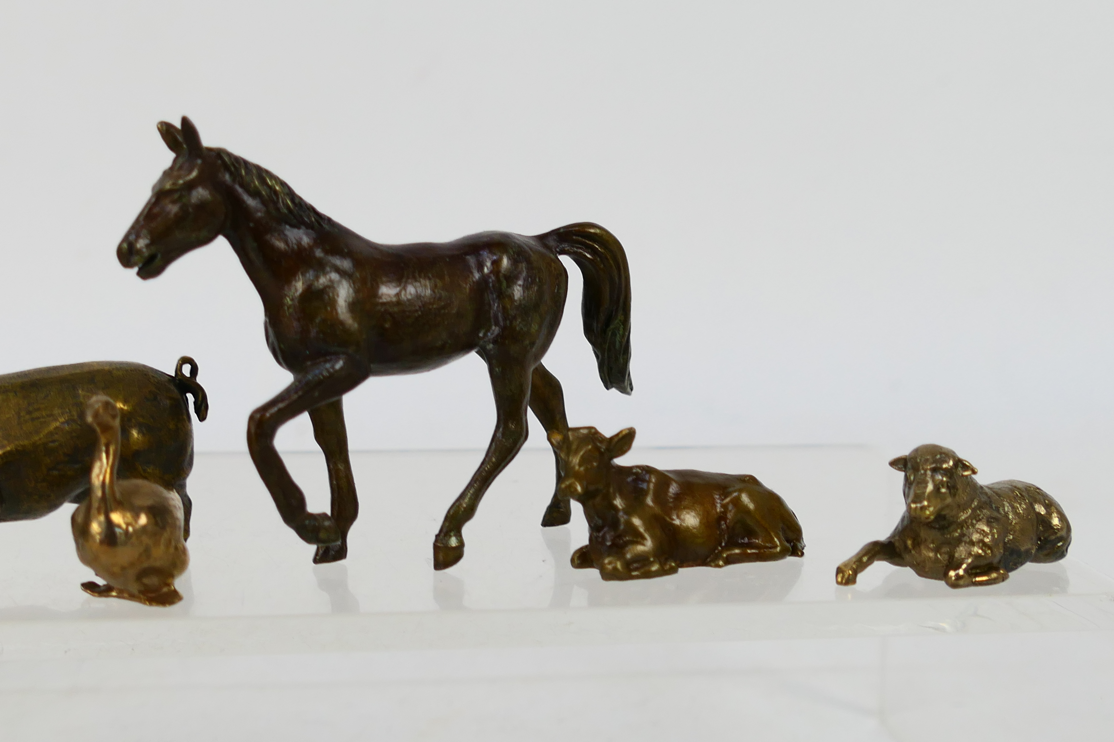 A collection of bronze figures of animals to include horse, bull / cows, sheep, birds, - Image 3 of 5