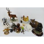 A collection of predominantly animal figures / groups to include a Franklin Mint pewter group