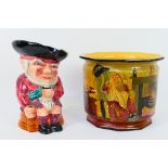 A Tams Ware Dickens Series jardiniere Mrs Gamp and a Shorter & Son Toby jug, 21 cm (h).