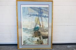 A large gilt framed print after Montague Dawson depicting a ship in heavy seas,