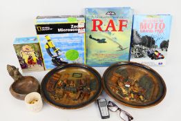 A mixed lot to include children's Shakespeare books, boxed microscope, continental wall plaques,