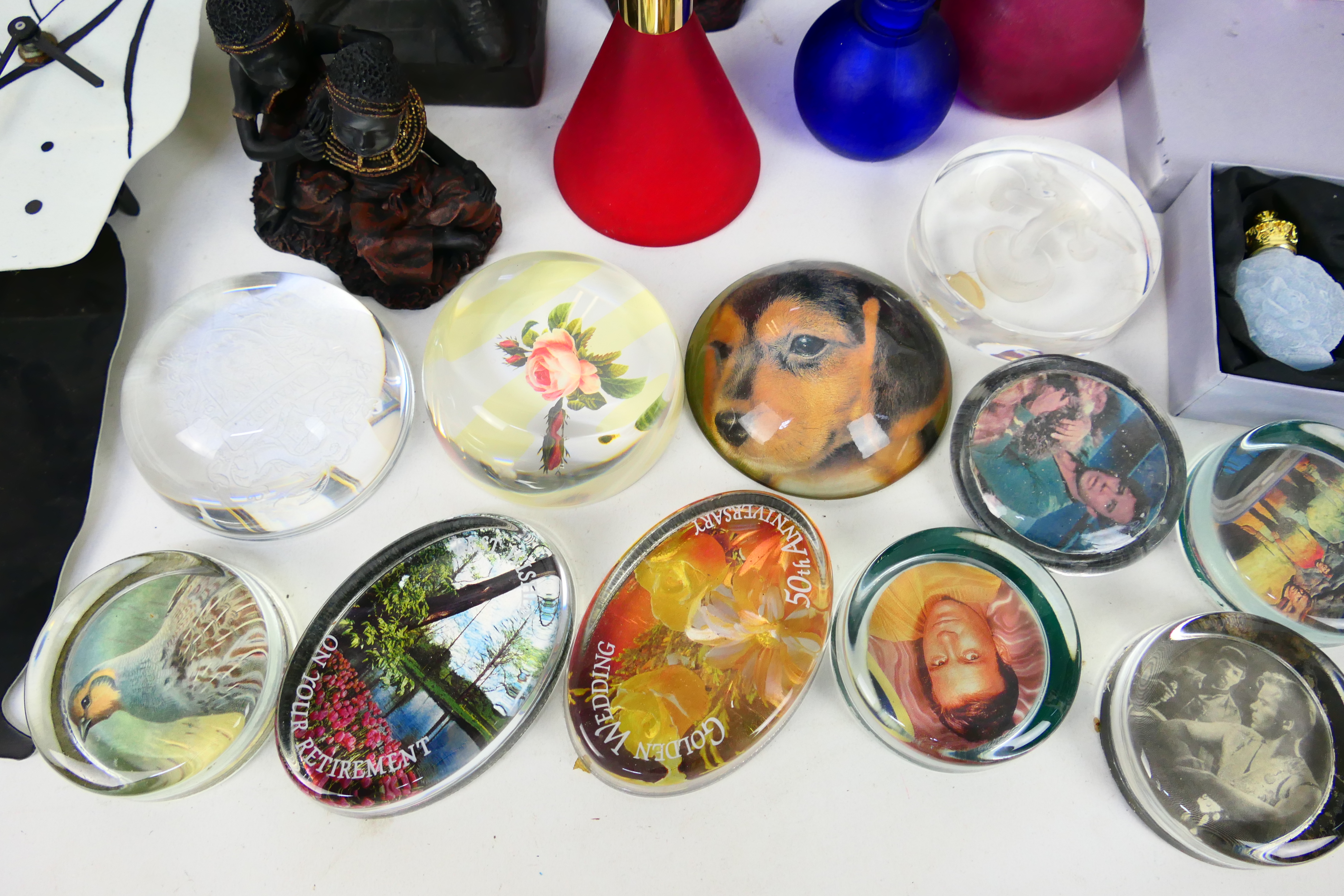 A mixed lot to include paperweights, Laurel & Hardy prints and wall clocks, various ornaments, - Image 4 of 7