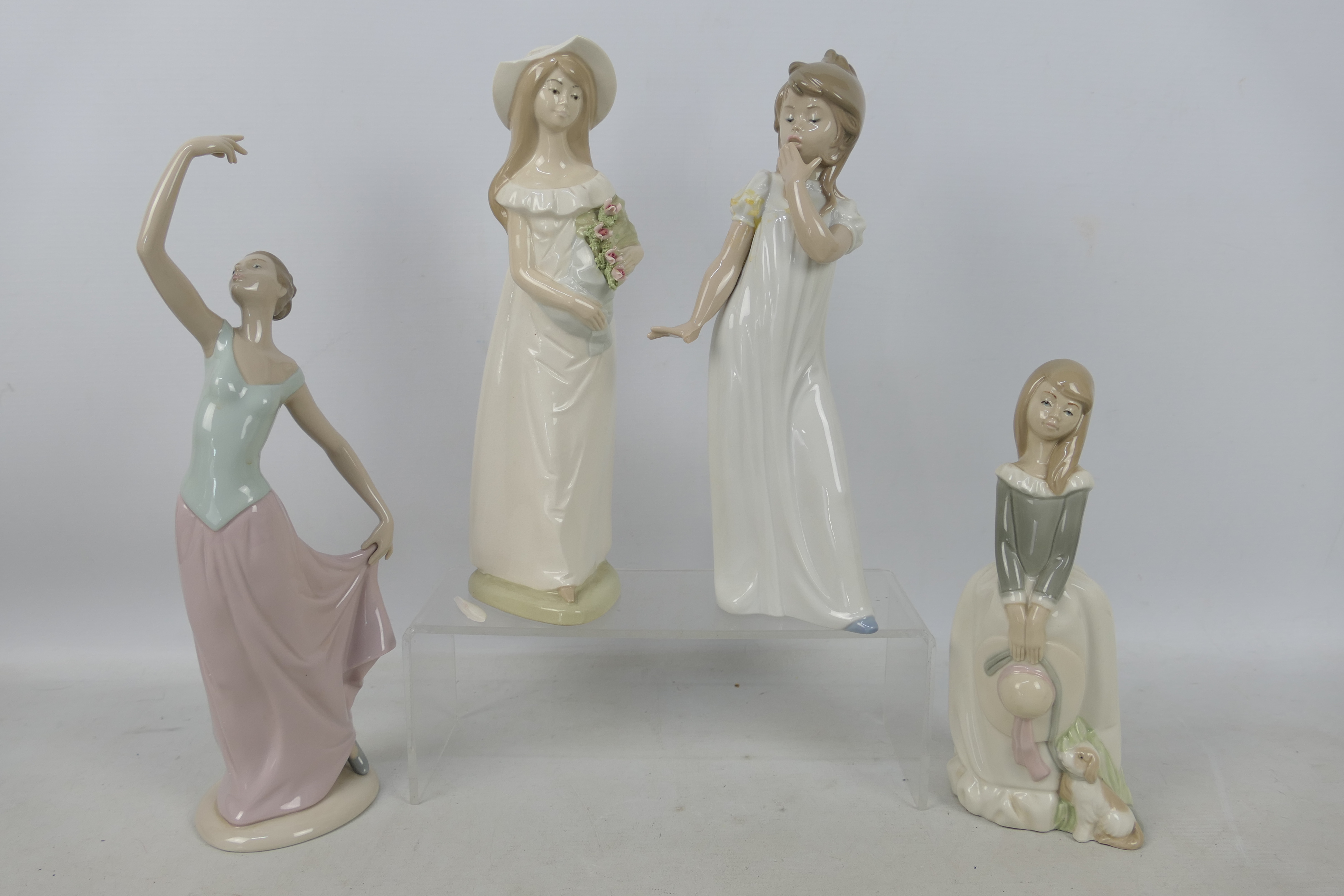 Four Spanish porcelain figures to include Nao, largest approximately 34 cm (h).