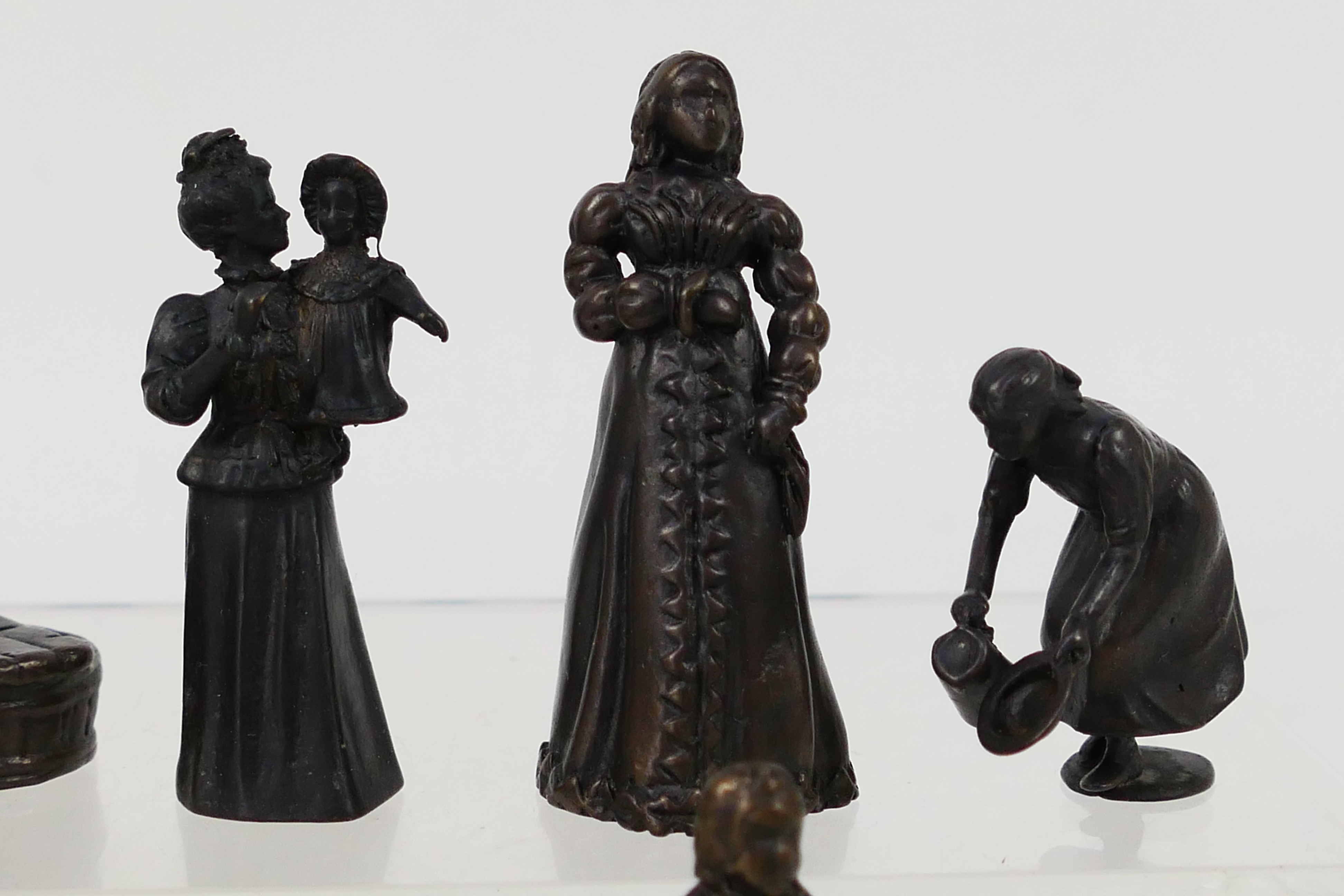 A collection of bronze figures to include Victorian style, servants, children and similar, - Image 3 of 5