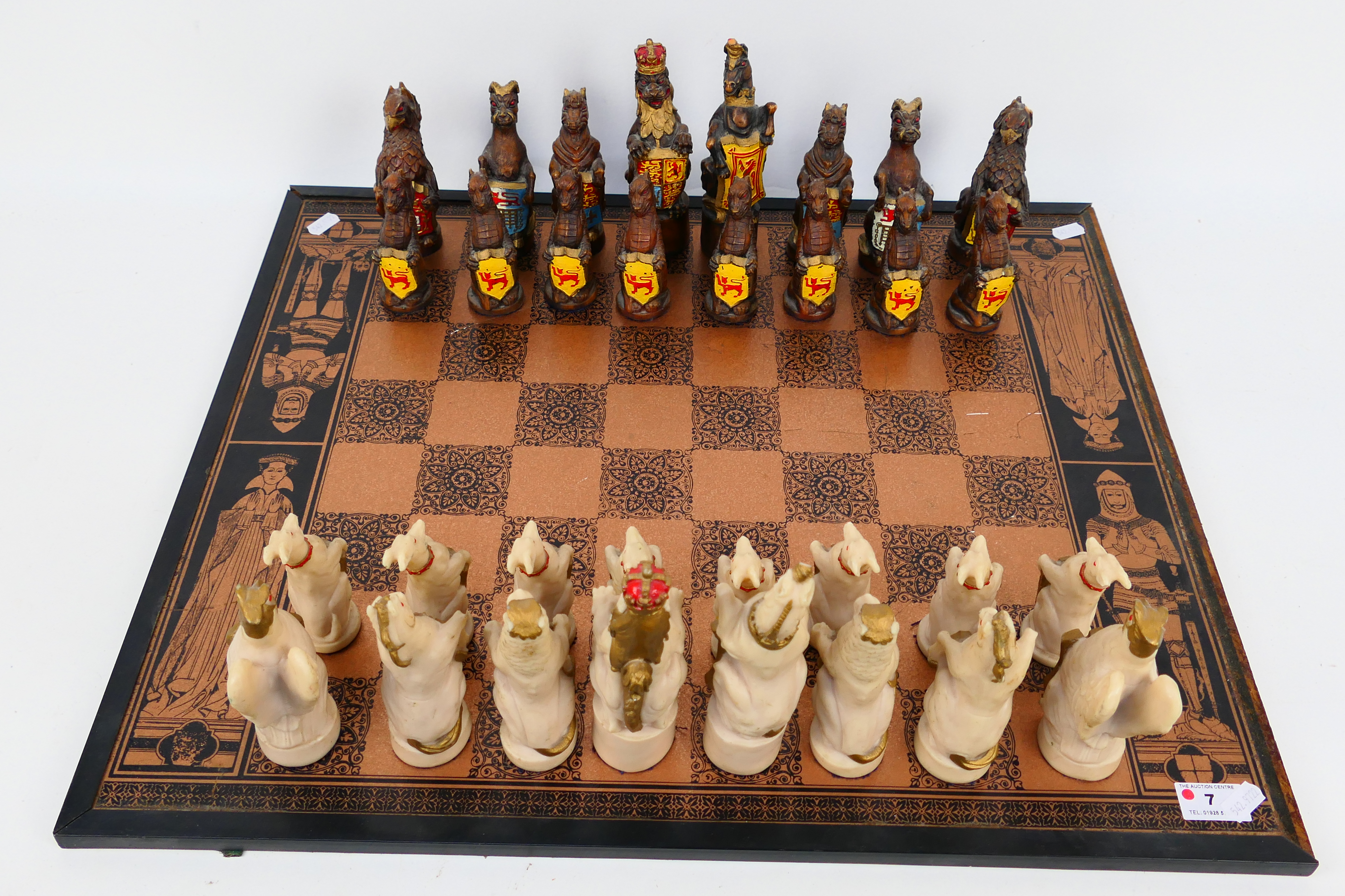 A Royal Beasts Queens Coronation chess set with 16 cm king.