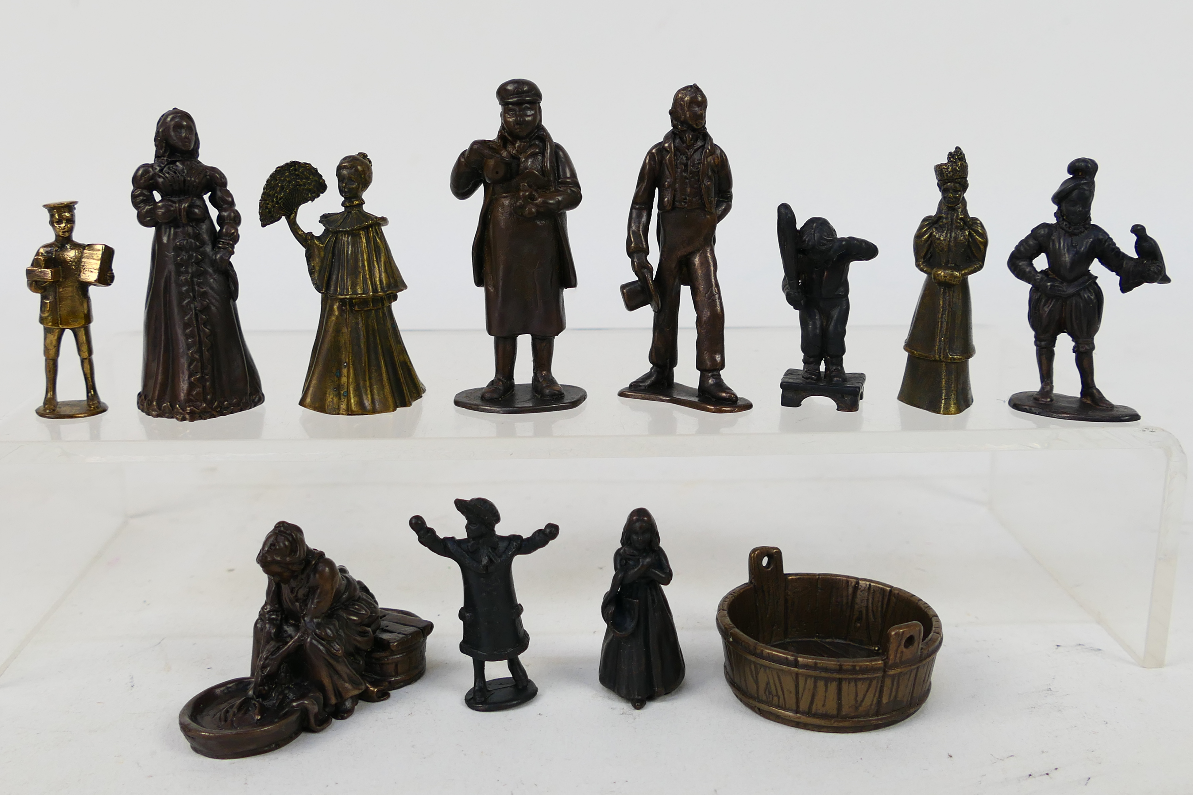 A quantity of bronze figures to include Victorian style, servants, children and other,